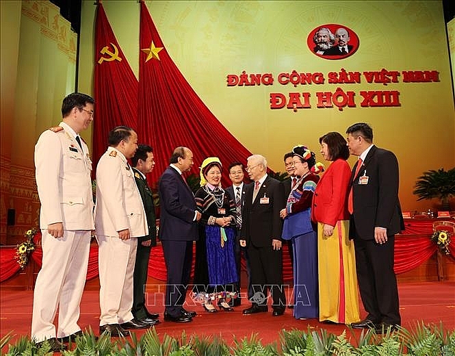 Tổng Bí thư, Chủ tịch nước Nguyễn Phú Trọng và Thủ tướng Chính phủ Nguyễn Xuân Phúc với các đại biểu. Ảnh: TTXVN