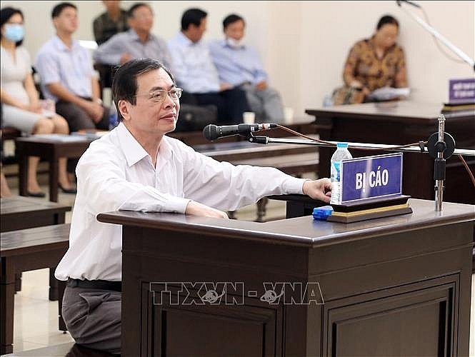  Bị cáo Vũ Huy Hoàng (cựu Bộ trưởng Bộ Công Thương) trả lời câu hỏi của Hội đồng xét xử. Ảnh: Phạm Kiên/TTXVN